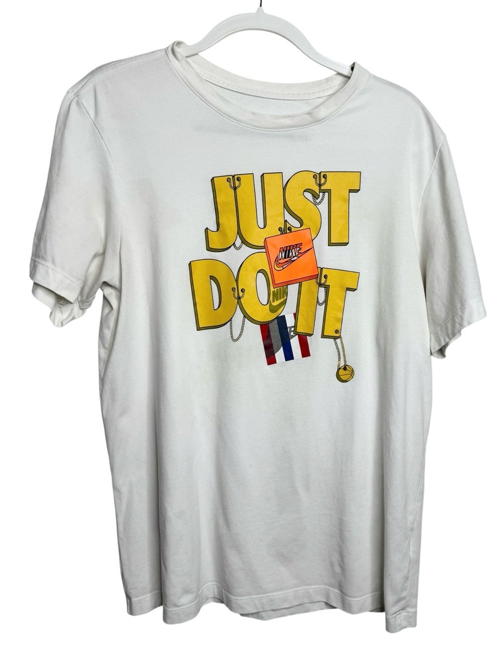 Nike White Short Sleeve Tee with Bold Yellow "Just Do It" Graphic